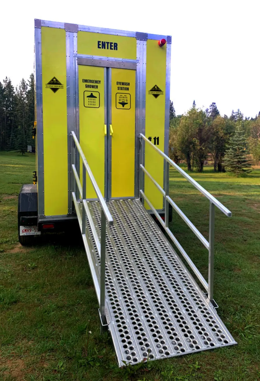 Emergency shower and eyewash trailer with safety ramp access